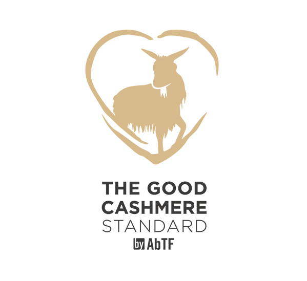 Logo mit einer stilisierten Ziege in einem Herz und dem Text "The Good Cashmere Standard by AbTF".